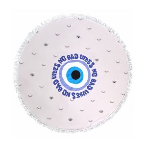 A round beach towel featuring a light background with eye patterns and fringe edges, and decorative text design.