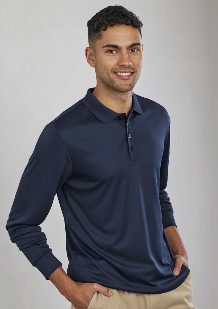 A navy long sleeve polo shirt with a collar and buttons, displayed on a smiling model. It features a logo.