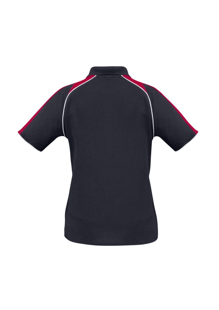 A women's short sleeve polo shirt in navy with red accents and a logo. Features a classic polo collar and sporty design.