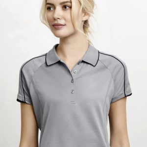 A grey women's short sleeve polo shirt with contrasting black accents and a collared neckline. It features a logo.