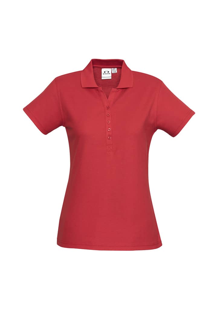A purple ladies' polo shirt featuring a collar and buttoned placket, with a logo on the chest.