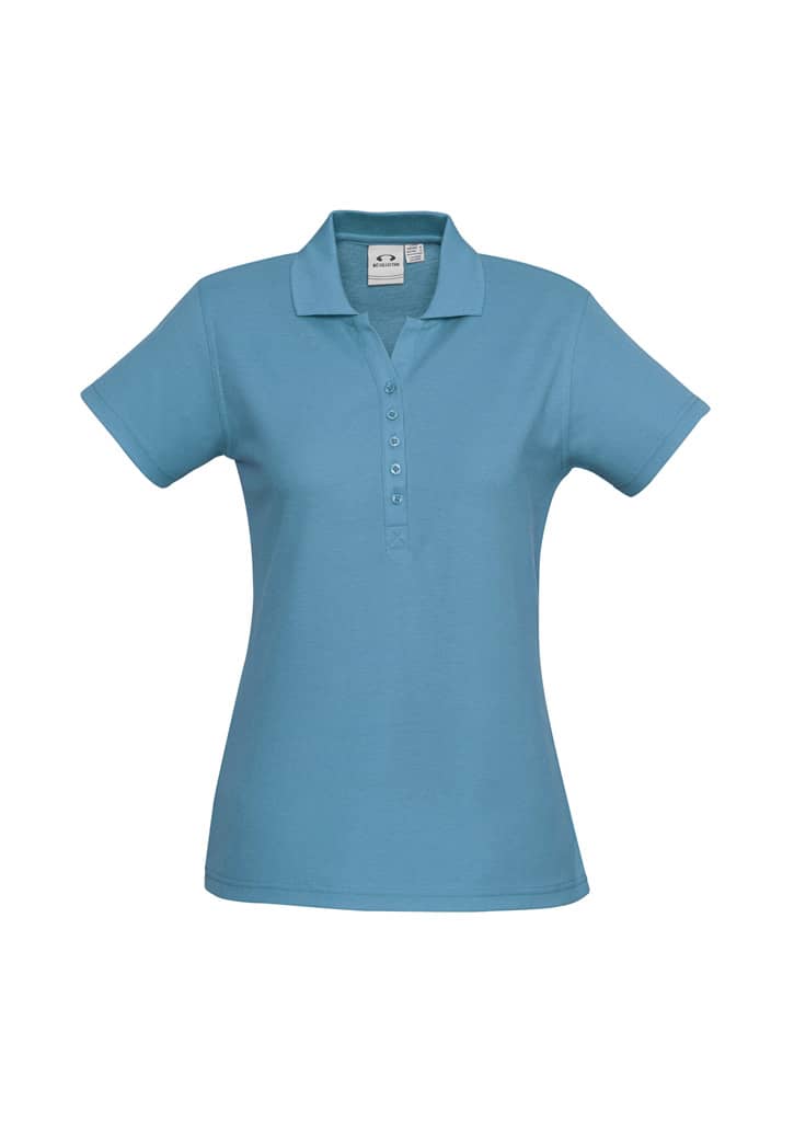 A grey ladies' polo shirt featuring a collar and button placket, with a logo on the label.