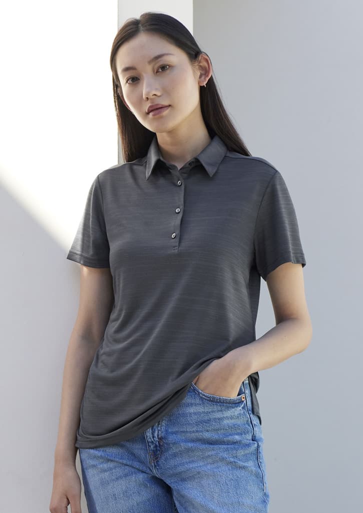 A women's short sleeve polo shirt in dark grey with a buttoned collar, featuring a subtle striped pattern and a logo.