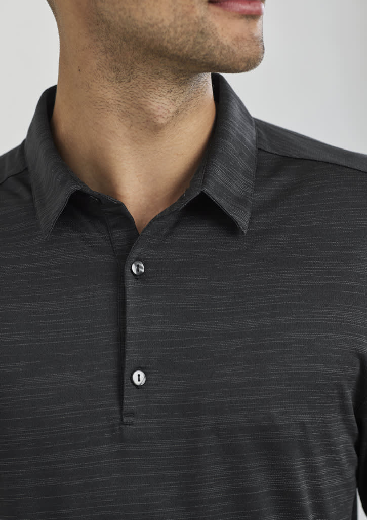 A close-up of a men's short sleeve polo shirt in dark grey with a buttoned collar and textured fabric.