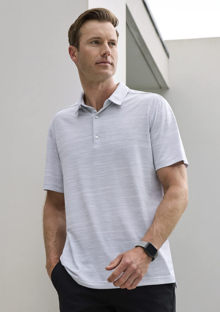 A men's short sleeve polo in light grey with a subtle striped design and a collar, featuring a logo.