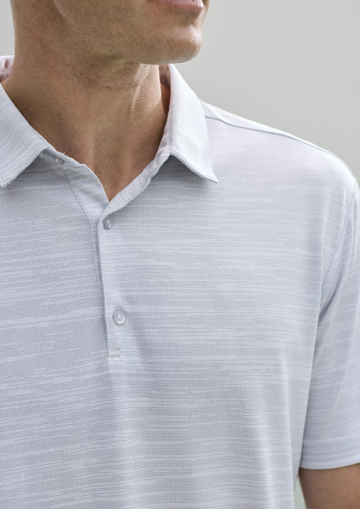 A light grey short sleeve polo shirt with a textured pattern and a logo on the chest.