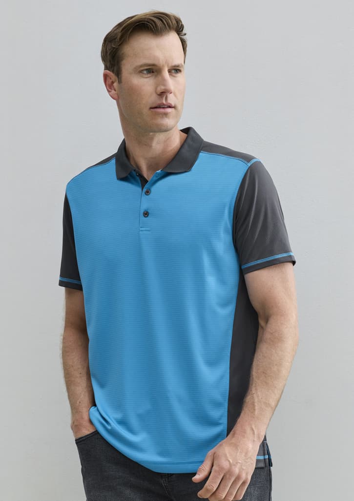 A men's polo shirt featuring a blue front and grey sleeves, with a three-button placket and branding on the chest.