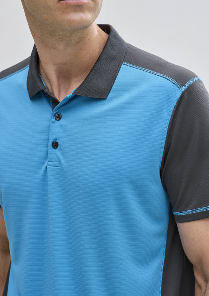 A short sleeve polo shirt featuring a blue front and gray sleeves, with a collar and button placket.