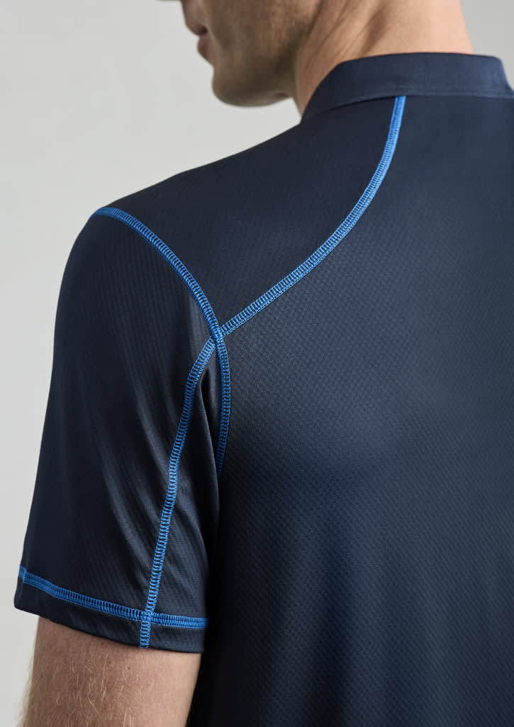 A men's short sleeve polo shirt in navy blue with contrasting blue stitching and a logo on the collar.