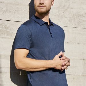 A navy blue short sleeve polo shirt on a male model, featuring a subtle texture and a logo.