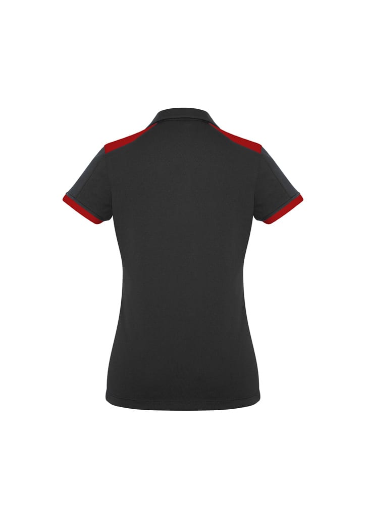 A black women's polo shirt featuring red accents on the collar and sleeves. Brand logo is visible.