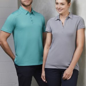 A short sleeve polo shirt in teal for men and light grey for women, featuring a logo on the chest.
