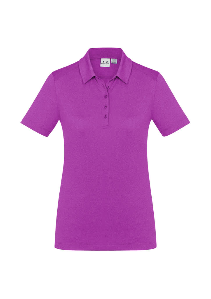 A women's polo shirt in vibrant purple, featuring a classic collar and short sleeves. It has a logo on the chest.