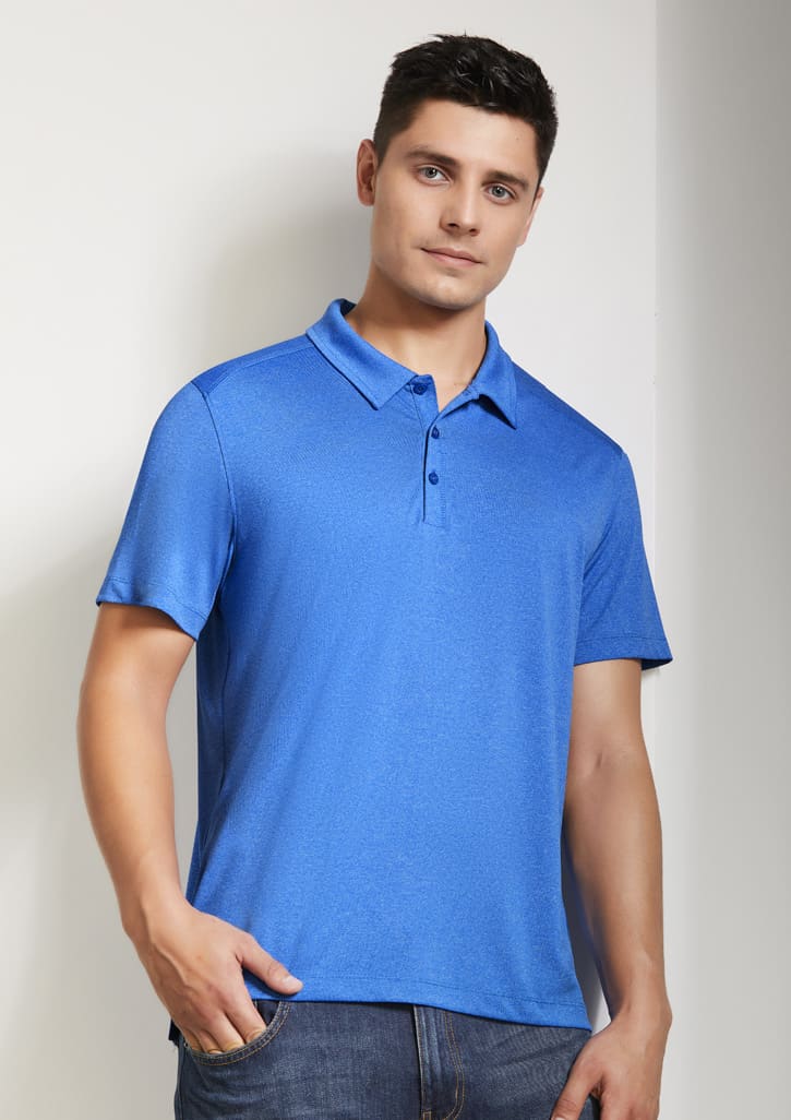 A blue short sleeve polo shirt with a collar and a logo, featured on a model against a light background.