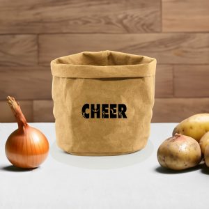A kraft paper storage bag in tan, featuring a logo, next to an onion and several potatoes on a wooden surface.