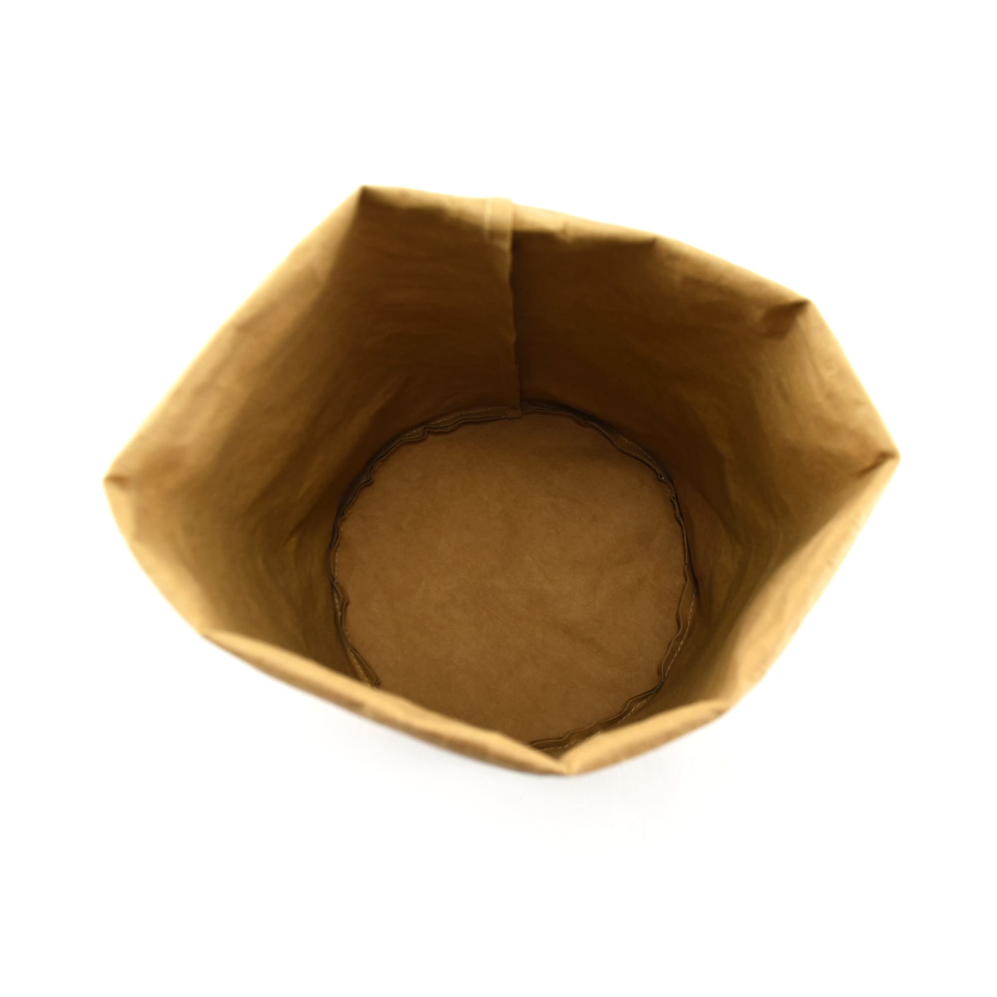 A brown kraft paper storage bag with an open top and a circular base, featuring a simple design and no branding.