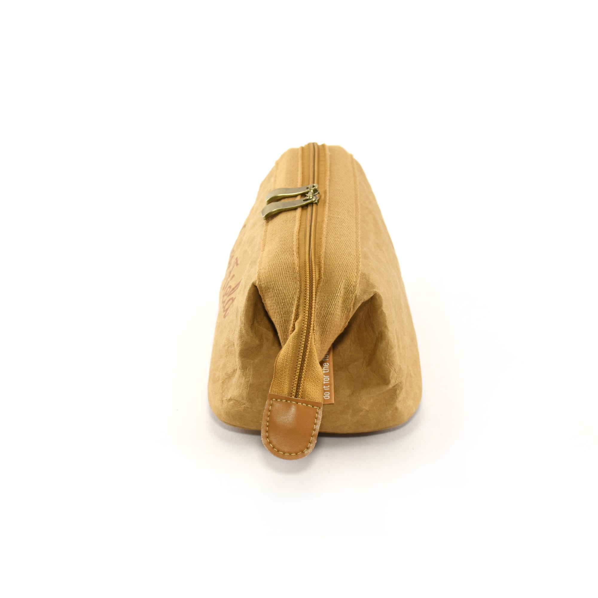 A tan kraft paper cosmetic bag with a zipper closure and a tan leather pull tab, featuring a logo.