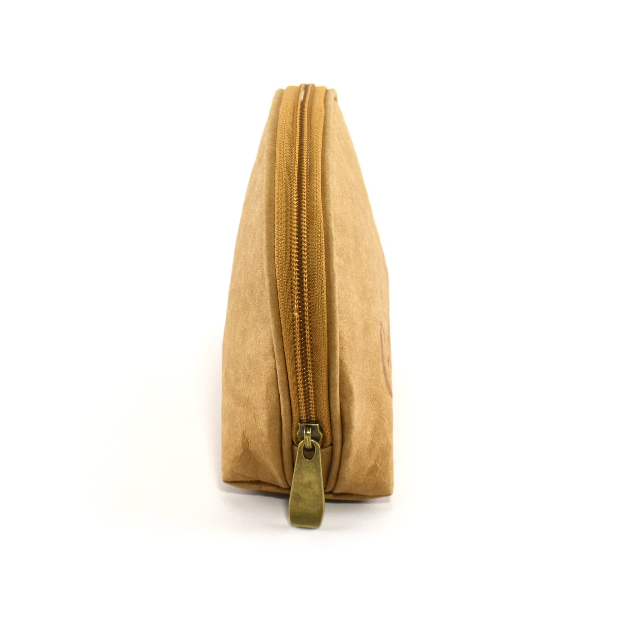 A tan kraft paper cosmetic bag with a gold zipper, featuring a simple design and a logo.