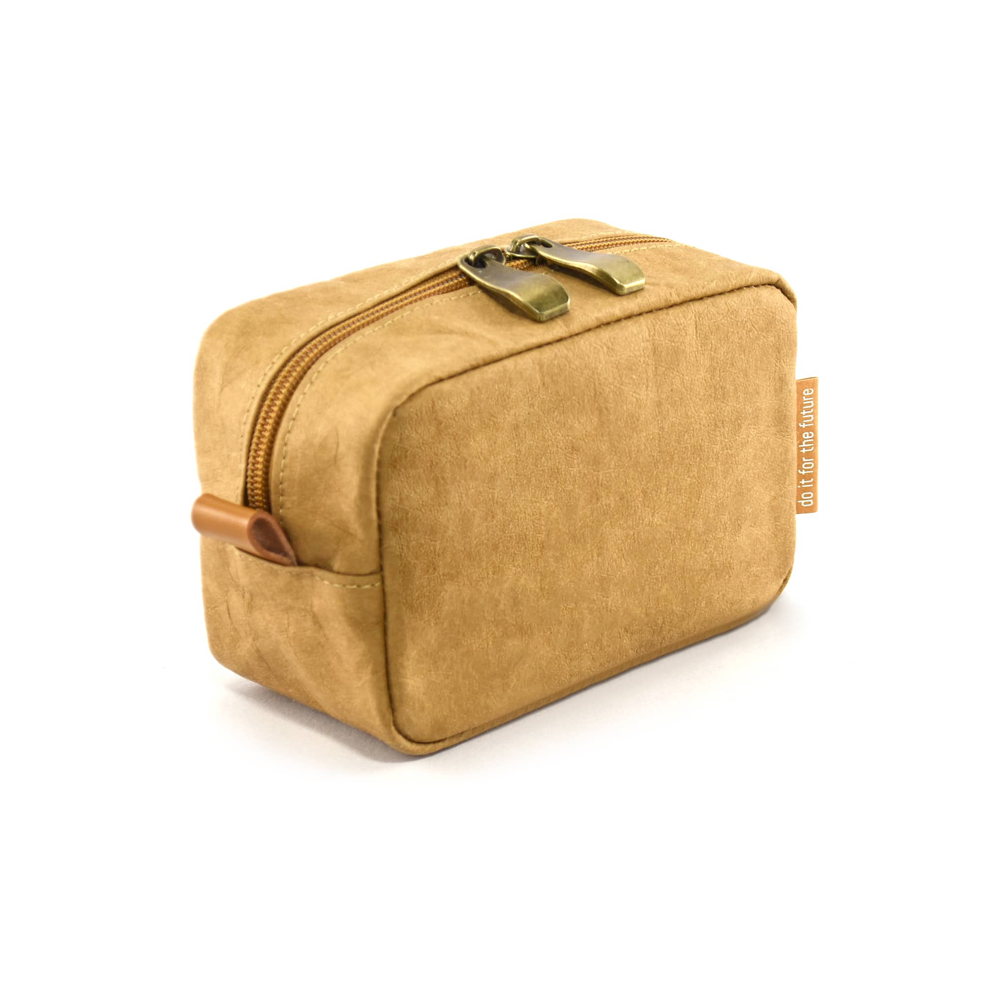A tan kraft paper cosmetic bag with a zip closure and zip pull, featuring an orange branding tag.