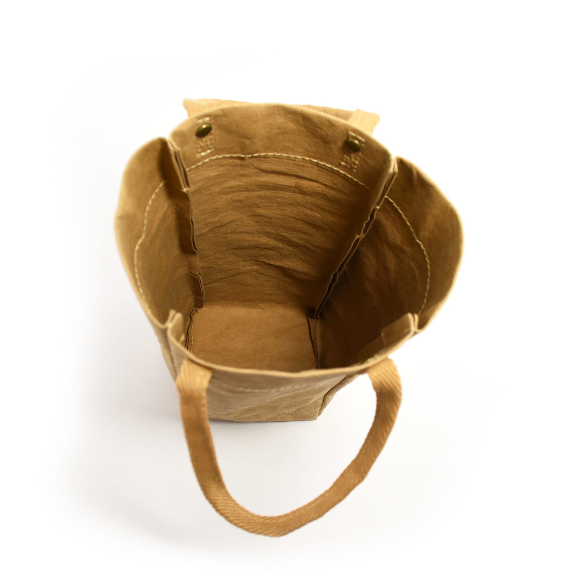 A kraft paper wine carry bag in brown, featuring a sturdy design with handles and an inner compartment.