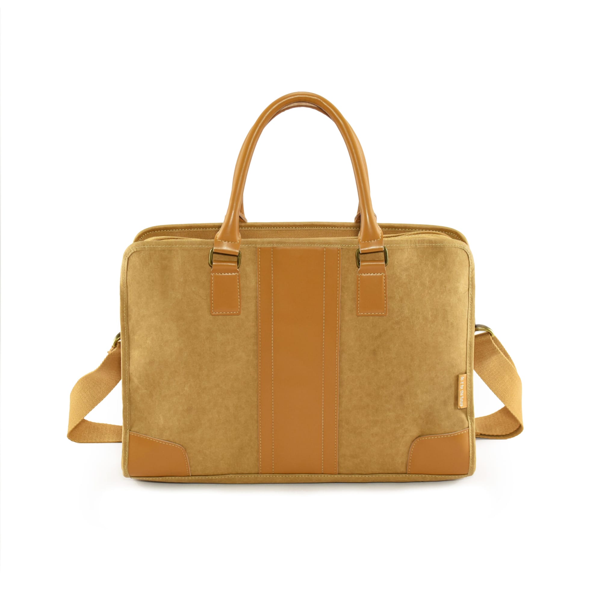 A tan satchel bag with brown accents, featuring dual handles and a detachable shoulder strap.