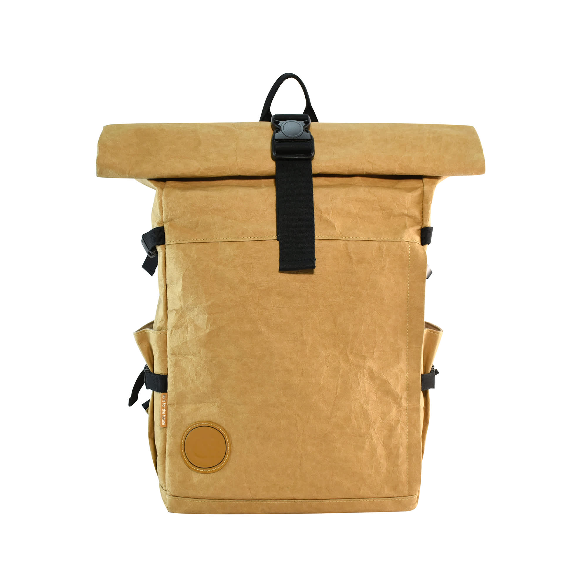A tan kraft paper laptop backpack with a roll-top design and adjustable straps. It features a logo on the front.