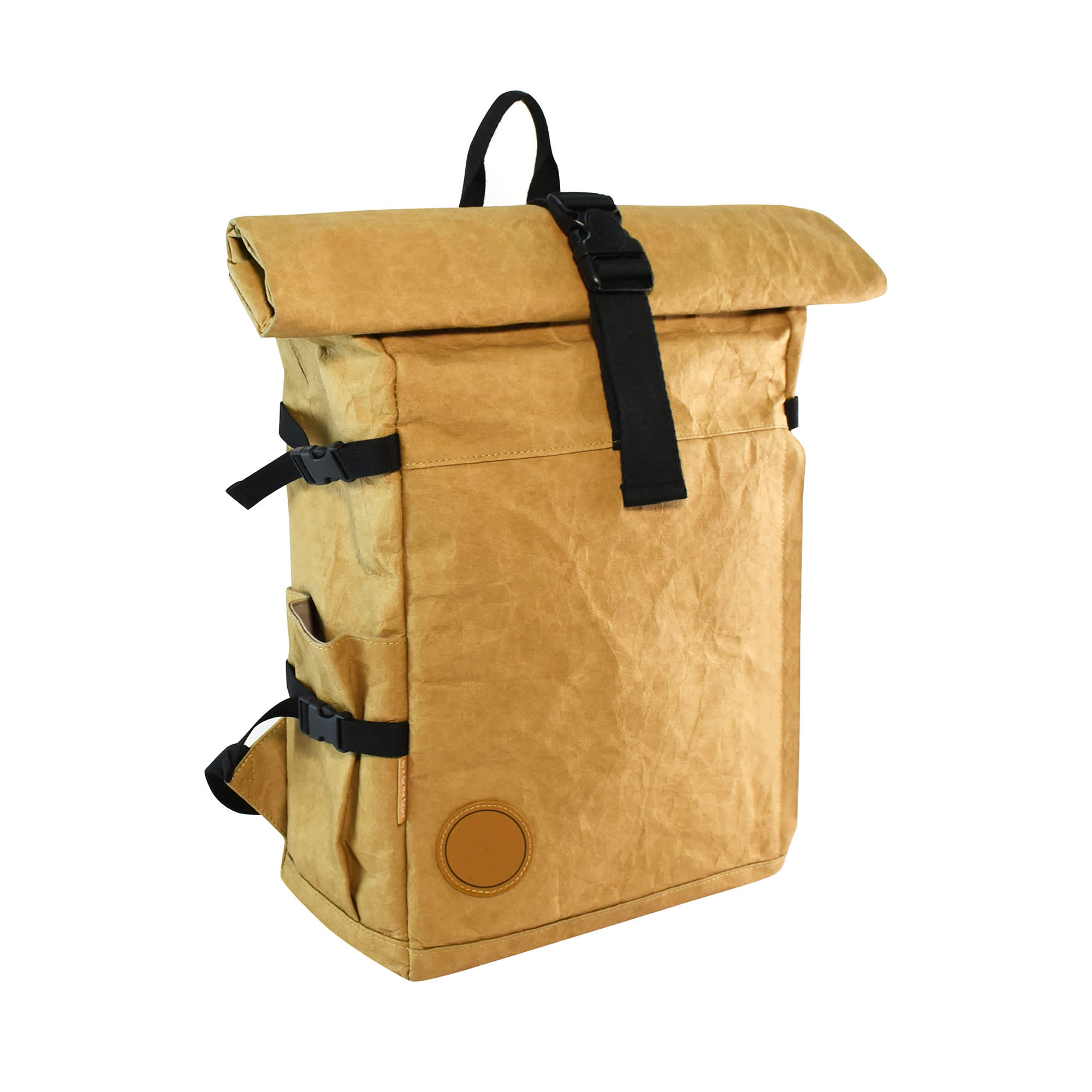 A roll-top laptop backpack in a warm brown kraft paper finish, featuring adjustable straps and a logo.