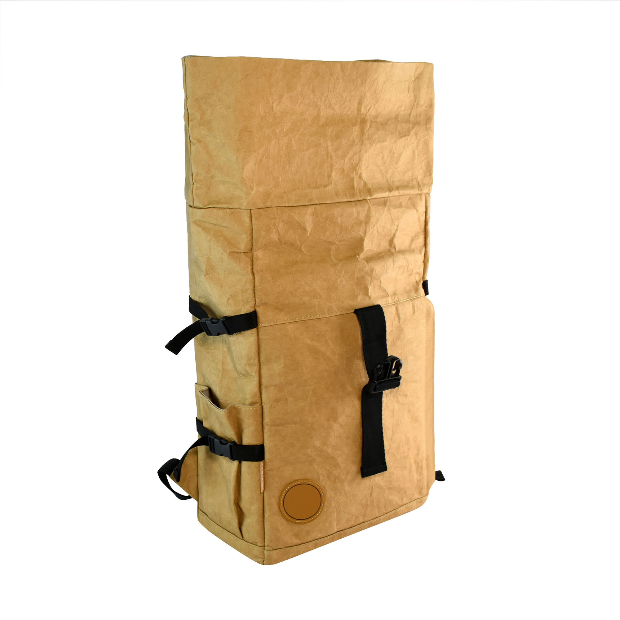 A tan kraft paper laptop backpack with adjustable straps, buckles, and a round logo on the front.