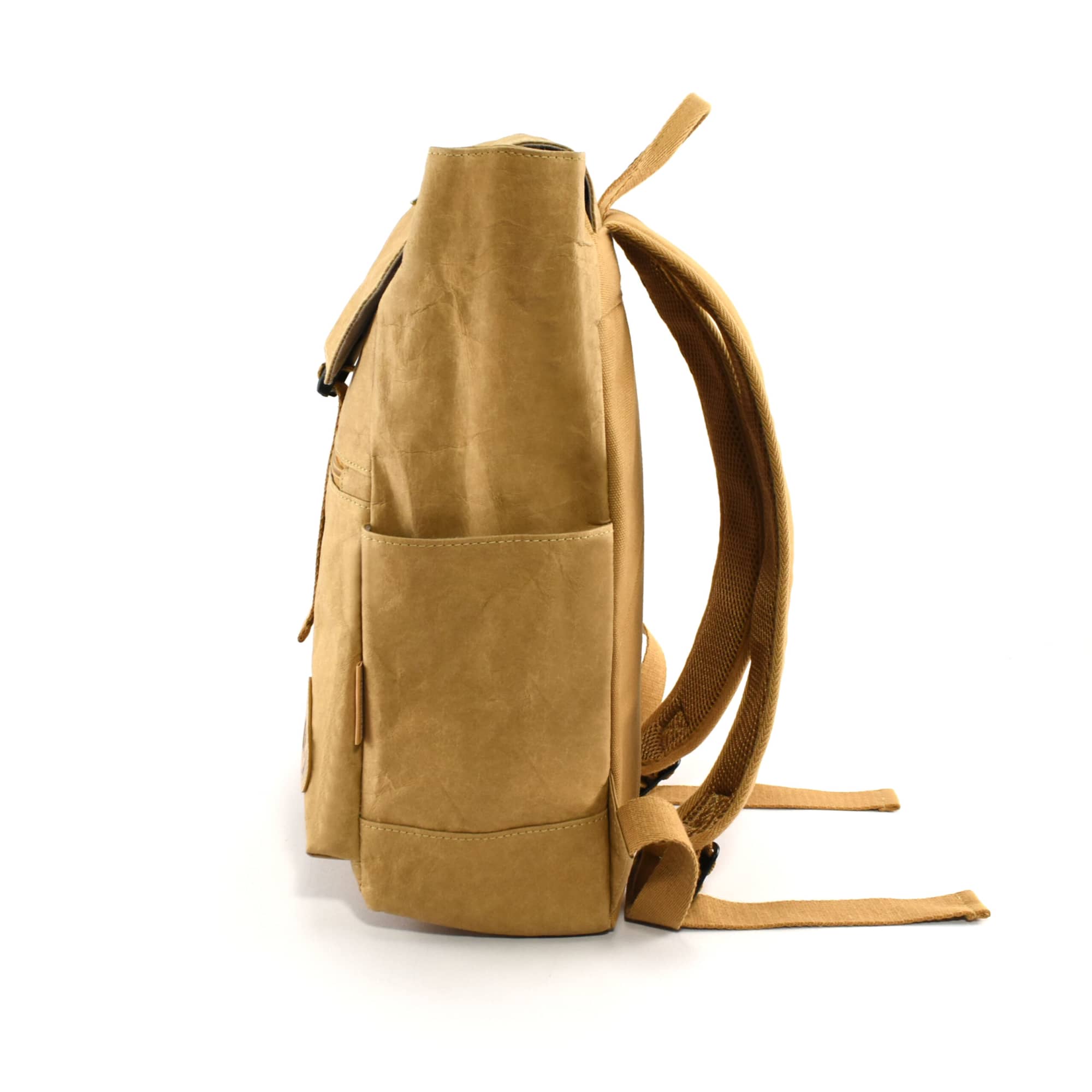 A tan kraft paper laptop backpack with adjustable straps and a side pocket, featuring a logo.