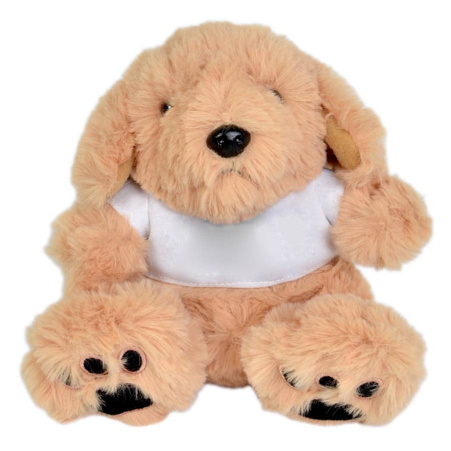 A plush toy dog in light brown with a white shirt and black paw details, featuring a soft, fluffy texture.