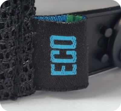A black cap featuring a breathable mesh back and a tag with 