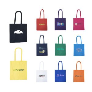 A collection of colourful tote bags in various shades, featuring different logos and branding.