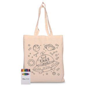 A cream calico tote bag featuring a space design with a UFO and planets, paired with a set of colourful crayons.