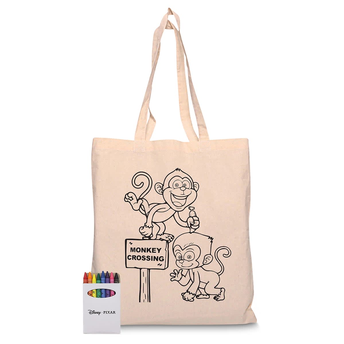 A beige calico bag featuring a monkey design, accompanied by a set of crayons in various colours.