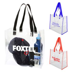 Clear tote bags in blue, red, and transparent, featuring black handles and various items inside, including a cap and drink bottle.