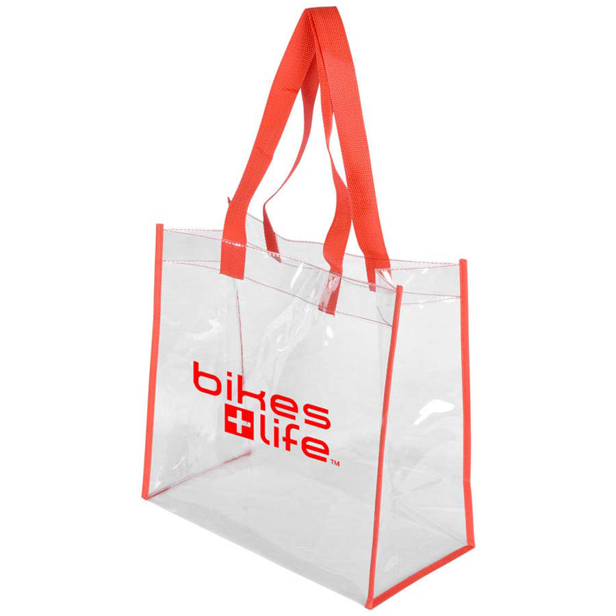 A clear tote bag with bright red handles and a logo on the front.
