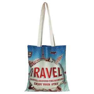 A full-colour cotton tote bag featuring travel-themed graphics and a logo, with light-coloured straps.