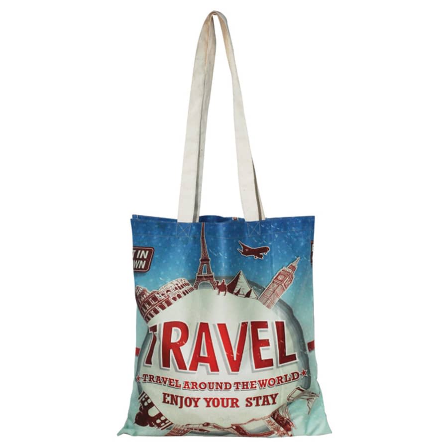 A full-colour cotton tote bag featuring travel-themed graphics and a logo, with light-coloured straps.