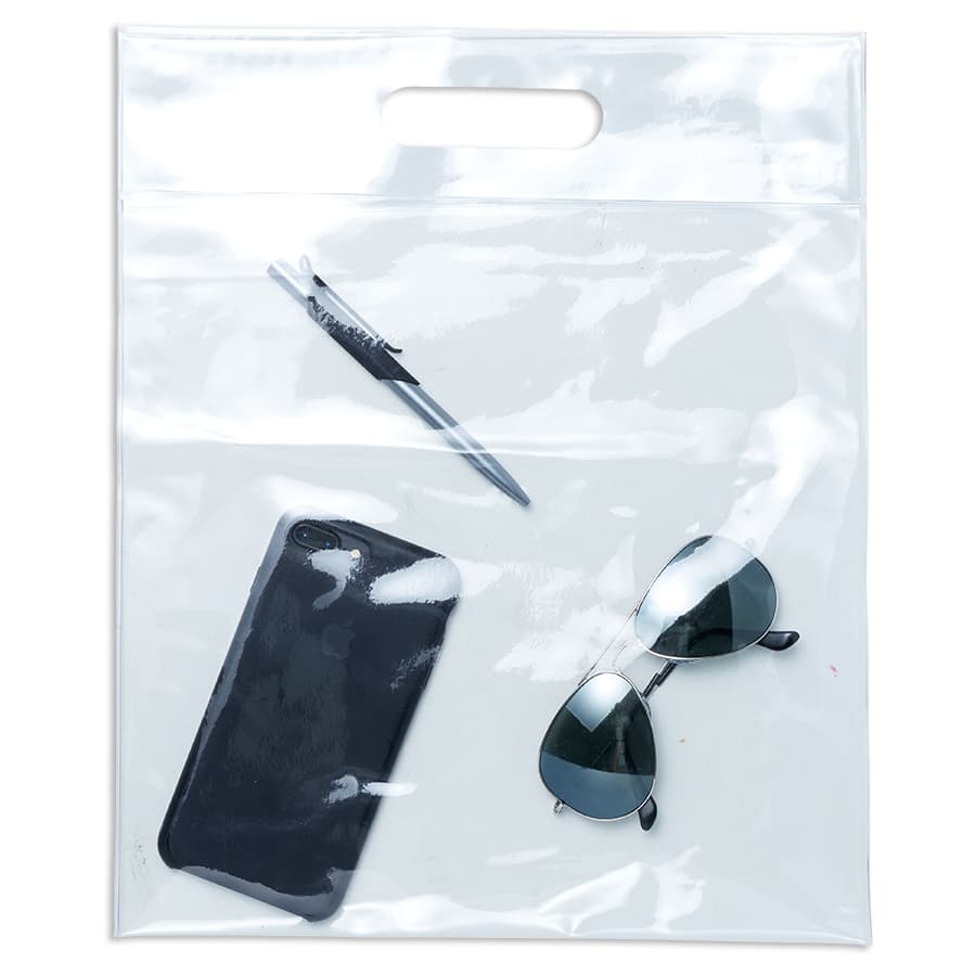 A clear tote bag containing a pen, sunglasses, and a mobile phone. The bag has a handle and a sleek design.