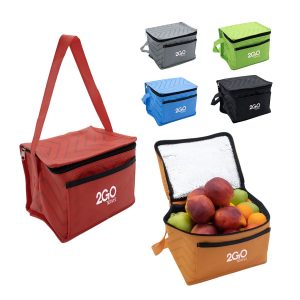 A red lunch cooler bag with a zippered top, surrounded by blue, grey, and black versions, filled with fruits.