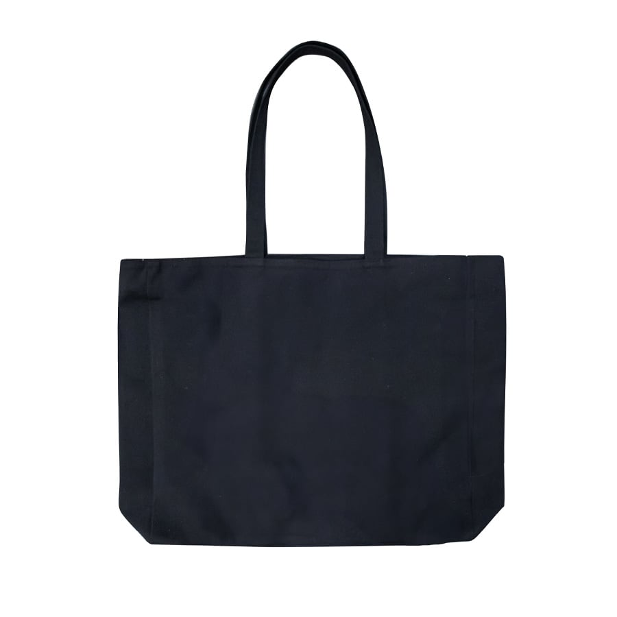 A black tote bag with an interior pocket and a visible logo. The bag's straps are being held by a hand.
