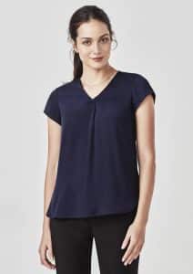 A navy blue women's blouse featuring a V-neck and pleat detail, styled with short sleeves and a relaxed fit.