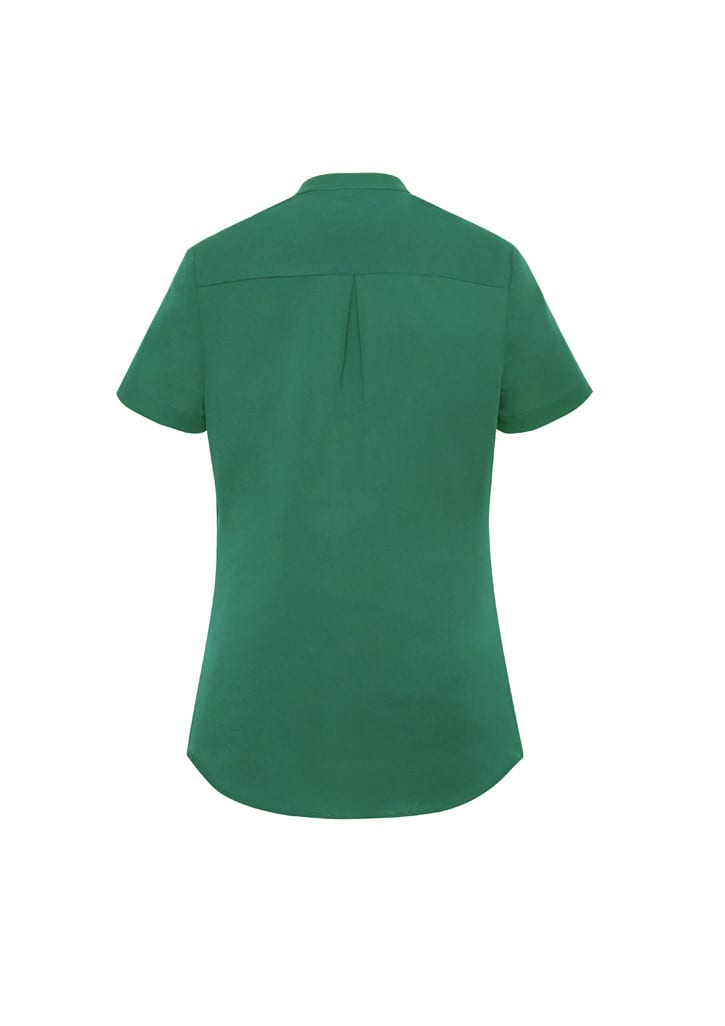 A green short sleeve blouse with a back pleat and a collar, featuring a logo.