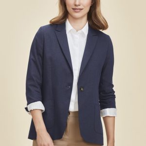 A women's blazer in navy blue, featuring a classic design with rolled-up sleeves and a logo on the lapel.