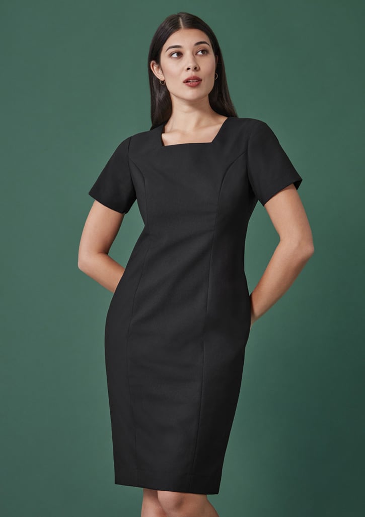 A short-sleeve navy dress with a square neckline and pockets, set against a green background.