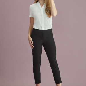 A pair of black mid-waist slim leg pants for women, styled with a white shirt and featuring a logo.