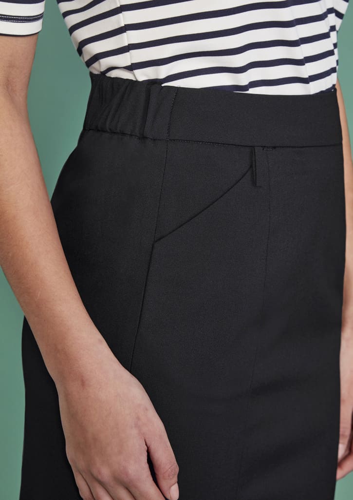 A close-up of a women's functional pencil skirt in black, featuring a smooth finish and elastic waistband.