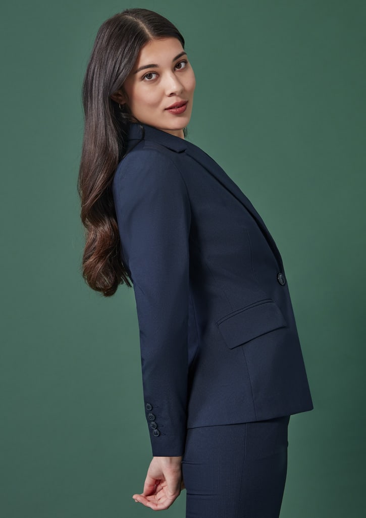 A mid-length women's blazer in navy blue, featuring a single button and tailored silhouette.