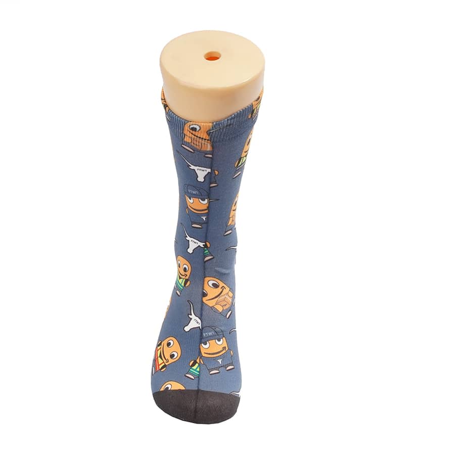 A pair of blue socks with playful character designs, featuring a solid toe and a subtle pattern.