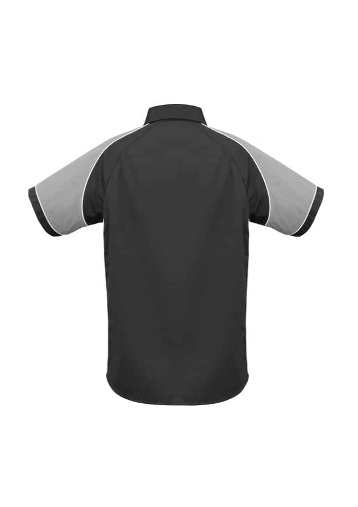 A short sleeve button-up shirt in black with grey accents and stitched detailing, featuring a logo.